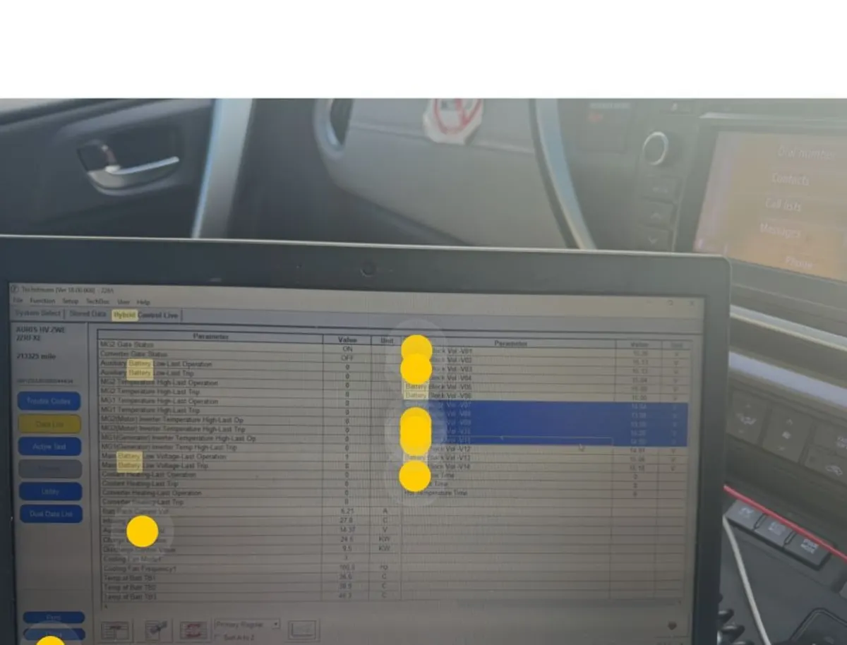 Laptop diagnostic screen showing hybrid control stored data
